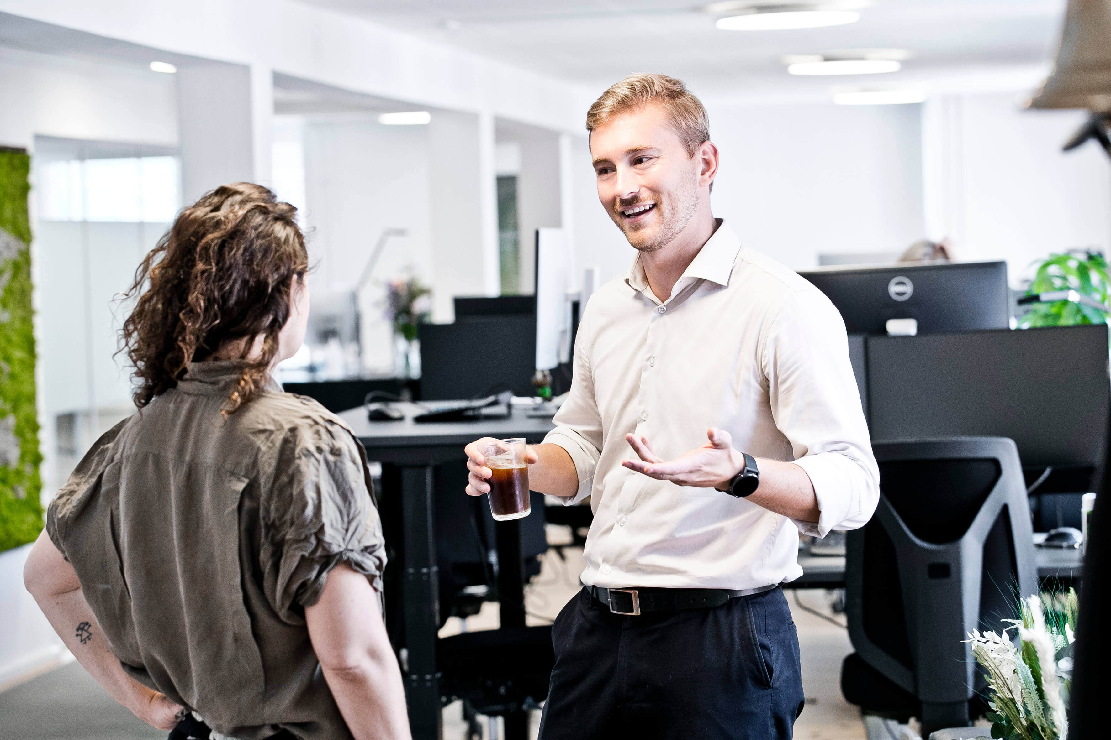 Employees_man and woman in conversation